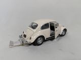 a small toy car with a ramp attached to it