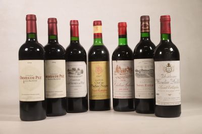 six bouteilles de vin sont alignées sur une table