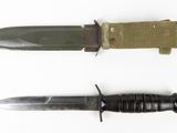 two different types of knives on a white surface