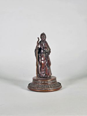 Sage à la pêche de longévité. Epreuve en bronze à patine bru…