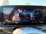 the dashboard of a car with a digital display on it