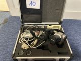 a case with a camera and other items in it
