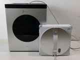 an image of a washing machine and a dryer on a table