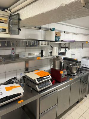 a kitchen with a lot of counter space in it