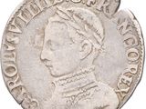 a close up of a coin with a woman ' s head on it