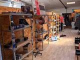 a large room with a lot of shelves and shelves on the wall
