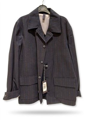 grey pinstripe suit jacket with black buttons on a hanger