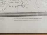 a picture of a map on a table with a pen and ink