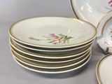 a lot of plates that are stacked on top of each other