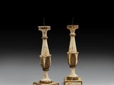 paire de chandeliers anciens en fonte
