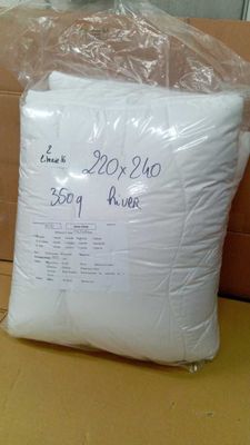 a bag of flour sitting on a table in front of a box