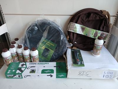 a backpack, a bag, and other items on a table
