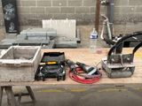 a table that has a bunch of tools on it