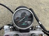 a close up of a speedometer on a motorcycle