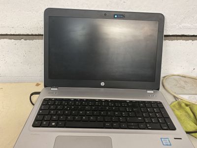 a laptop computer that is sitting on a table