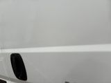 a white van with a black door handle on the side of it