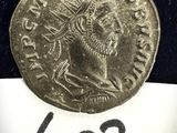un gros plan d'une pièce de monnaie posée sur une feuille de papier