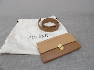 beige and tan leather purse with matching belt and matching pouch
