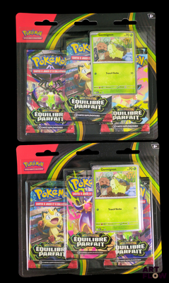two packs of pokemon trading cards are in the packaging