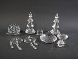 several pieces of crystal on a table with a black background