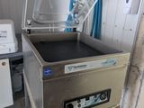 une image d'une friteuse commerciale dans une cuisine