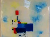painting on glass with blue, yellow, red, and white colors