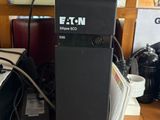 an image of a computer on a desk with a lot of electronics
