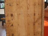 a large piece of wood sitting on a table in a room
