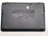 a laptop that is sitting on a white surface