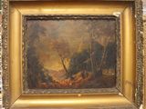 an oil painting of a wooded scene in a gold frame on a brick wall