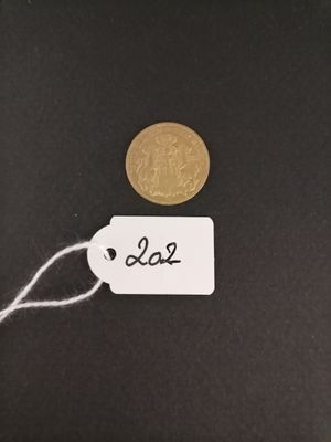 a small piece of paper that has a tag on it