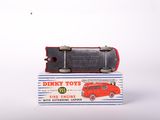 a red toy car sitting on top of a box