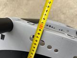 a measuring tape attached to the back of a cell phone