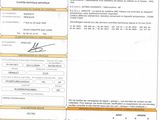 un gros plan d'un document sur lequel figure la photo d'une personne