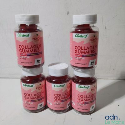 four bottles of collagen gummies sitting on a table