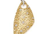 un pendentif en or et diamants, signé Van Cleef