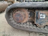 a close up of a tractor tire on the ground
