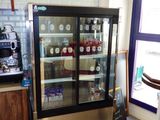 an image of a kitchen with a refrigerator in it