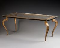 Maison RAMSAY. TABLE-BASSE à plateau mouvementé reposant sur…