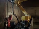 a yellow crane that is sitting in a building