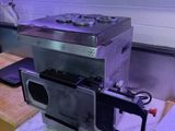 a microwave that is sitting on a counter in a kitchen