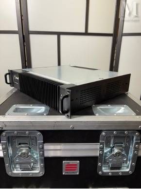 a black case that has two speakers on top of it