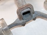 an old pipe wren sitting on top of a sink