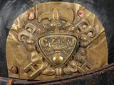 a close up of a helmet with a shield on it