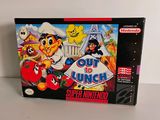 un gros plan sur une boîte de jeu Nintendo sur laquelle figurent plusieurs personnages de dessins animés