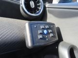 a remote control in the center of a car