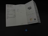une photo d'un document sur lequel figure la photo d'une personne