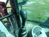 a close up view of a gear shift in a tractor