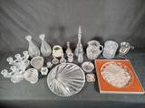 a lot of glass items that are on a table