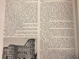 an open book with a picture of a building in it